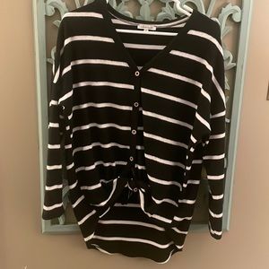 button down long sleeve. ties at the bottom. great condition